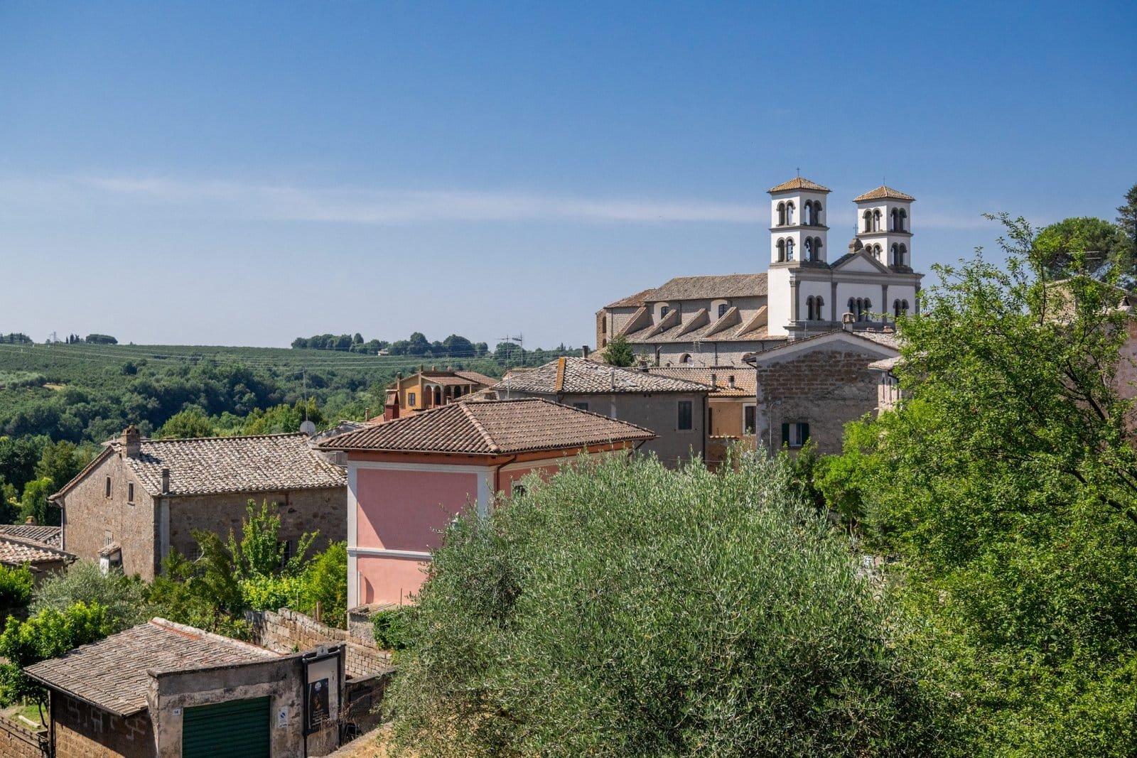 The view from the garden over Bassano in Teverina’s rooftops and bell tower to the wooded Tiber Valley beyond.