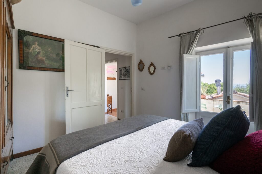 Bright bedroom with garden windows, Two Sisters Villa