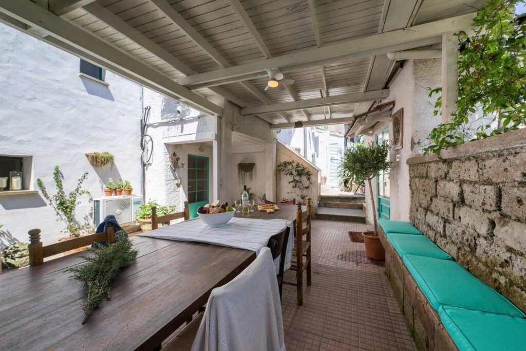 Covered outdoor dining terrace, Two Sisters Villa